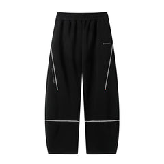 Contrasting-color knit curved-blade pants with a loose-fit athletic and casual style