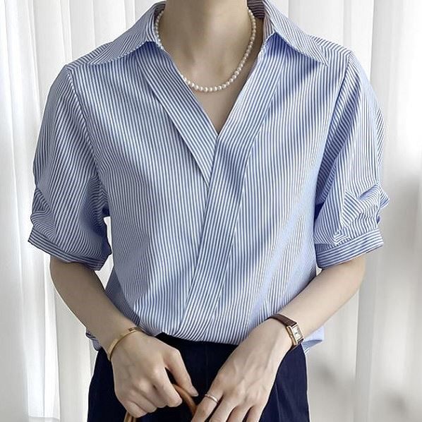 Blue and white striped shirt top