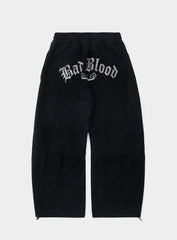 [w-pts25-016] Lion Patch 2 Way Curved Jogger - Washed Black