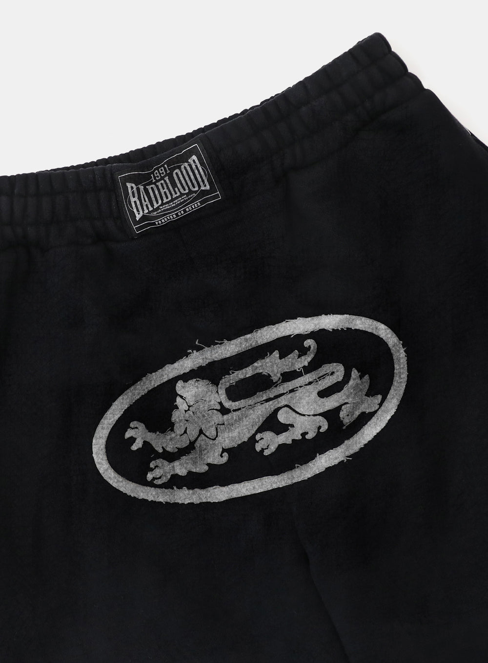 [w-pts25-016] Lion Patch 2 Way Curved Jogger - Washed Black