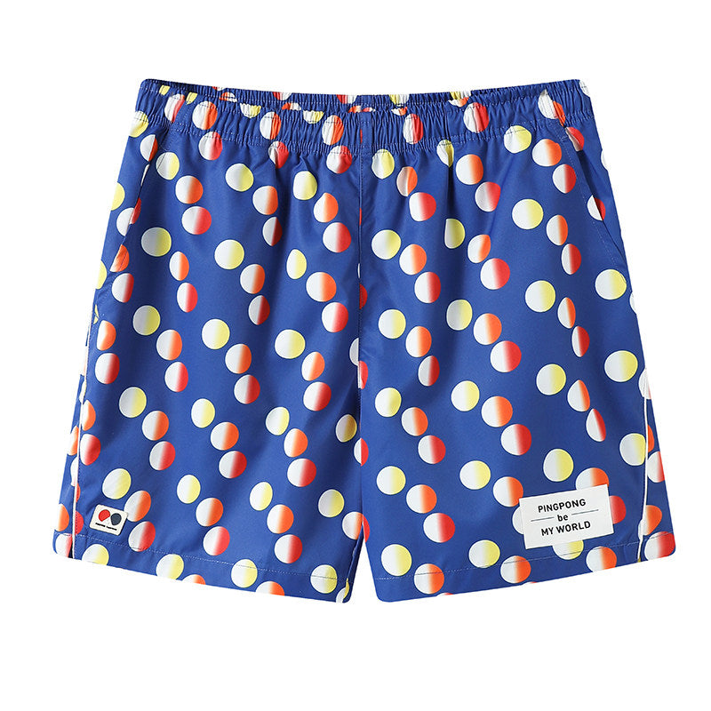 Form-fitting multi-color polka-dot collared side-seamed tennis-style stretchy waist short pants