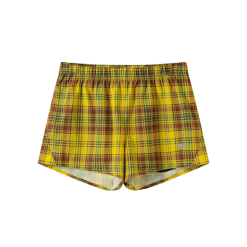 Printed athletic shorts with check pattern, leopard print and floral design, featuring an inner lining