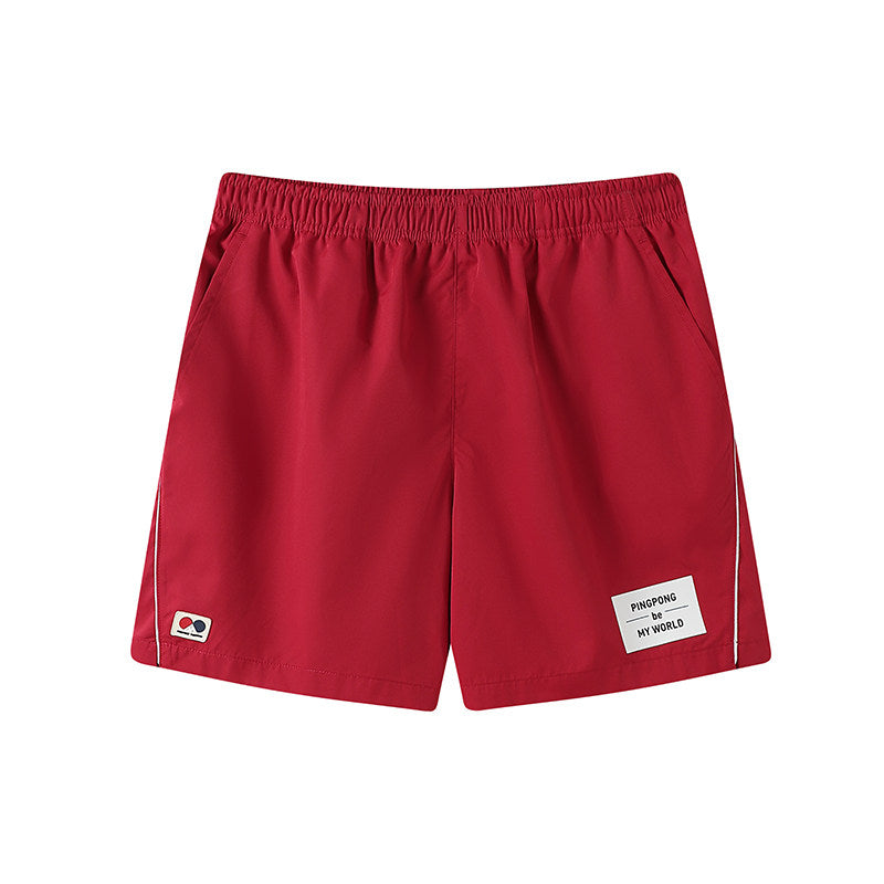 Form-fitting multi-color polka-dot collared side-seamed tennis-style stretchy waist short pants
