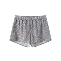 Printed athletic shorts with check pattern, leopard print and floral design, featuring an inner lining